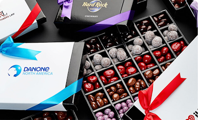 Customized Gifts with logos from clients such as the Hard Rock casino and iHeart Radio.